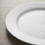 PLATO PLANO CON ALA DE PRESENTACION PORCELANA 30 CM SCHIMDT - Imagen 4